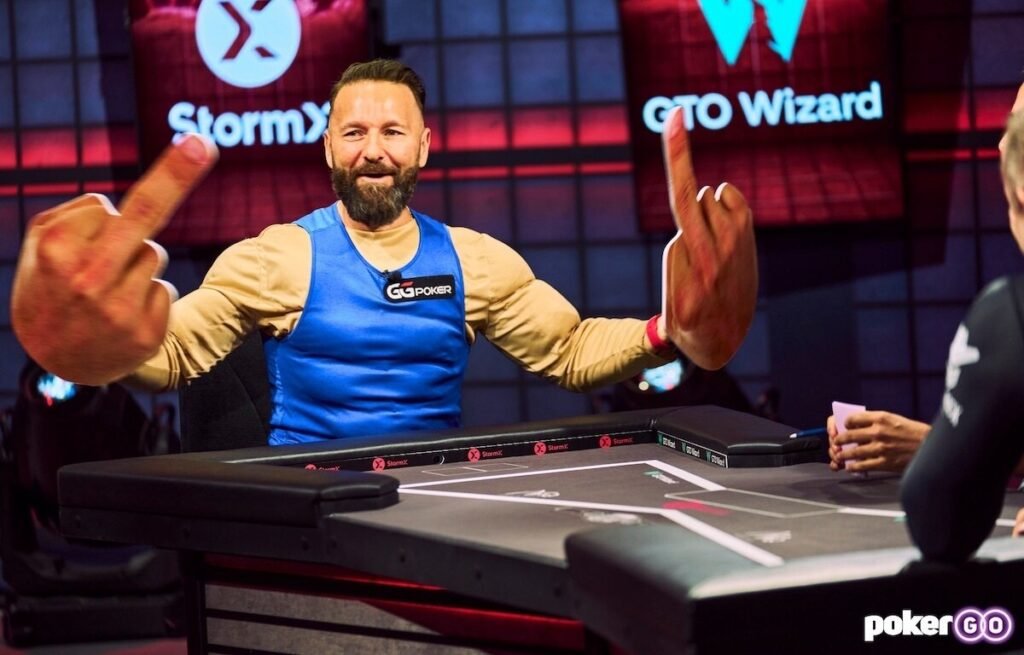 Daniel Negreanu posing with some oversized middle fingers prior to his heads-up match with Eric Persson on High Stakes Duel on PokerGO.